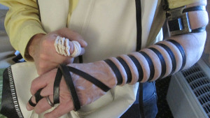 Tefillin wrapped on arm